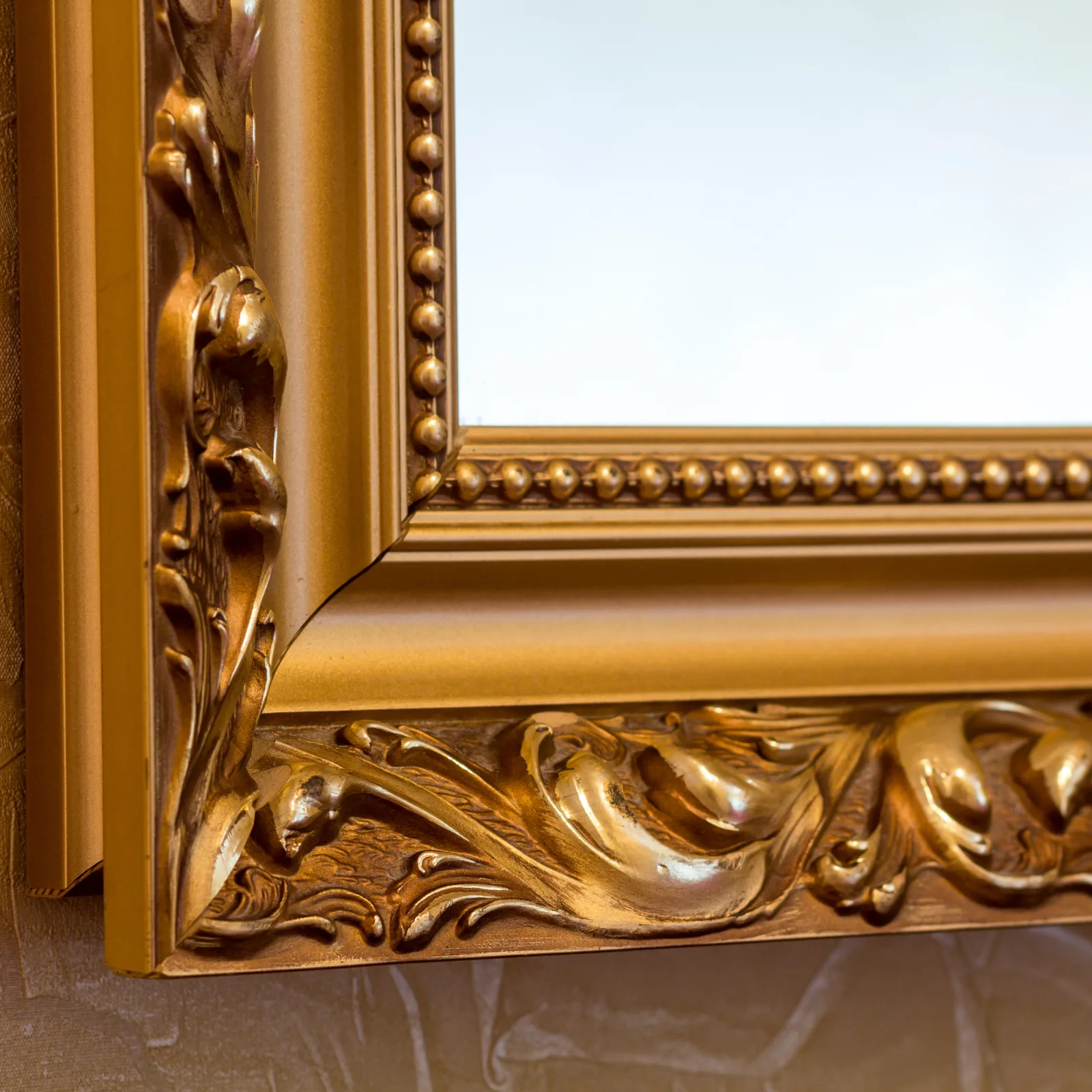 Grand miroir ancien en bois doré sculpté racheté à Antibes